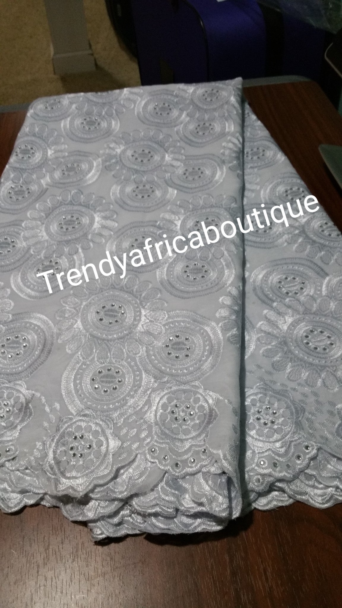 White/White swiss lace fabric for Nigerian party dress. Sold per 5yds