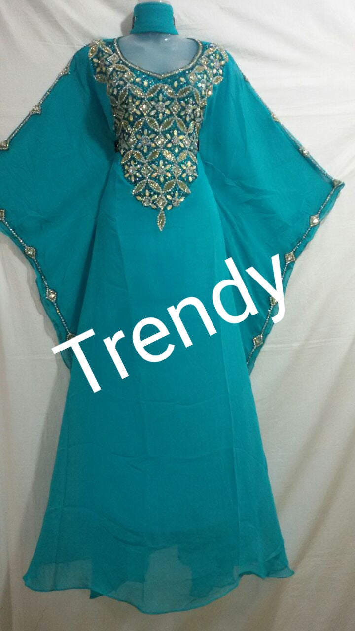 Turqouse blue African Bubu kaftan dress. Full chest Dazzling Crystal Stones and sleeve line. Free flowing rob.