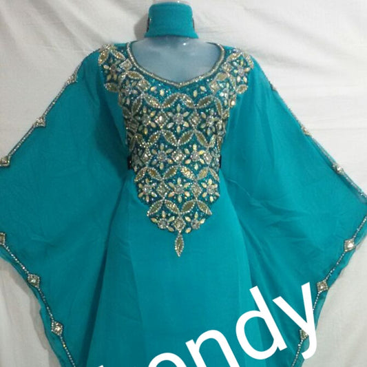 Turqouse blue African Bubu kaftan dress. Full chest Dazzling Crystal Stones and sleeve line. Free flowing rob.