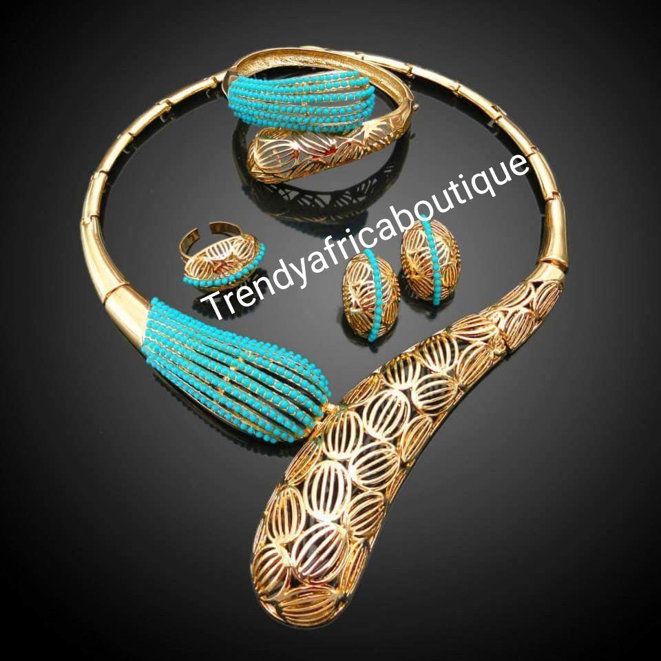 18k gold plated 4pcs necklace set with turquoise blue accent. Matching bangle, earrimgs, & ring. Sold as a set