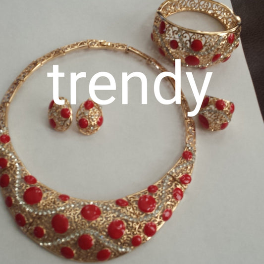 4pc omega necklace set.  18K gold plating with Red beads accent. Hypoallergenic quality