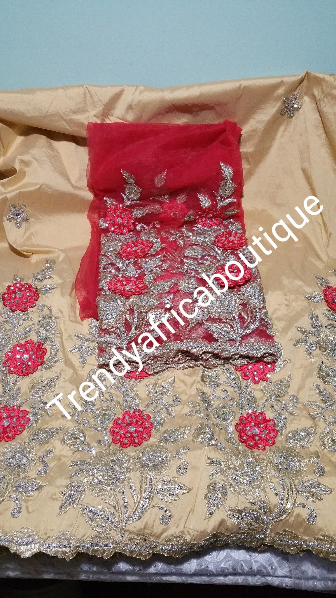 Nigerian Tranditional George wrapper. Embriodery/stones design in Champagne/coral red matching blouse. Small-George.