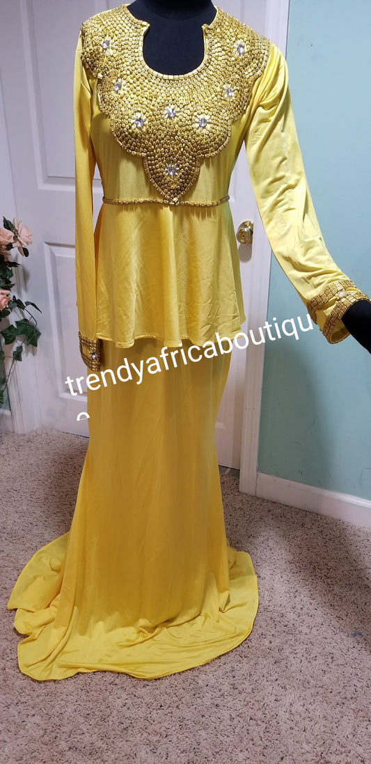 Yellow Kaftan dress. Free flowing I can Kaftan made with Lycra materia and beaded with gold beads. Soft texture, long 60" dress