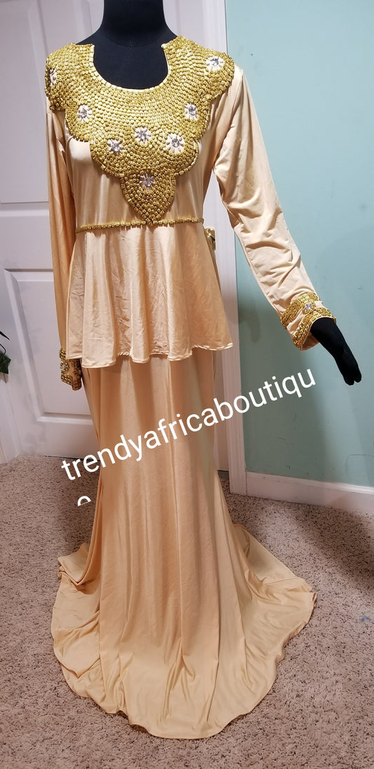 Indian Kaftan dress made with Lycra/spandex fabric. Long free flowing dress champagne gold color wit Gold beads.