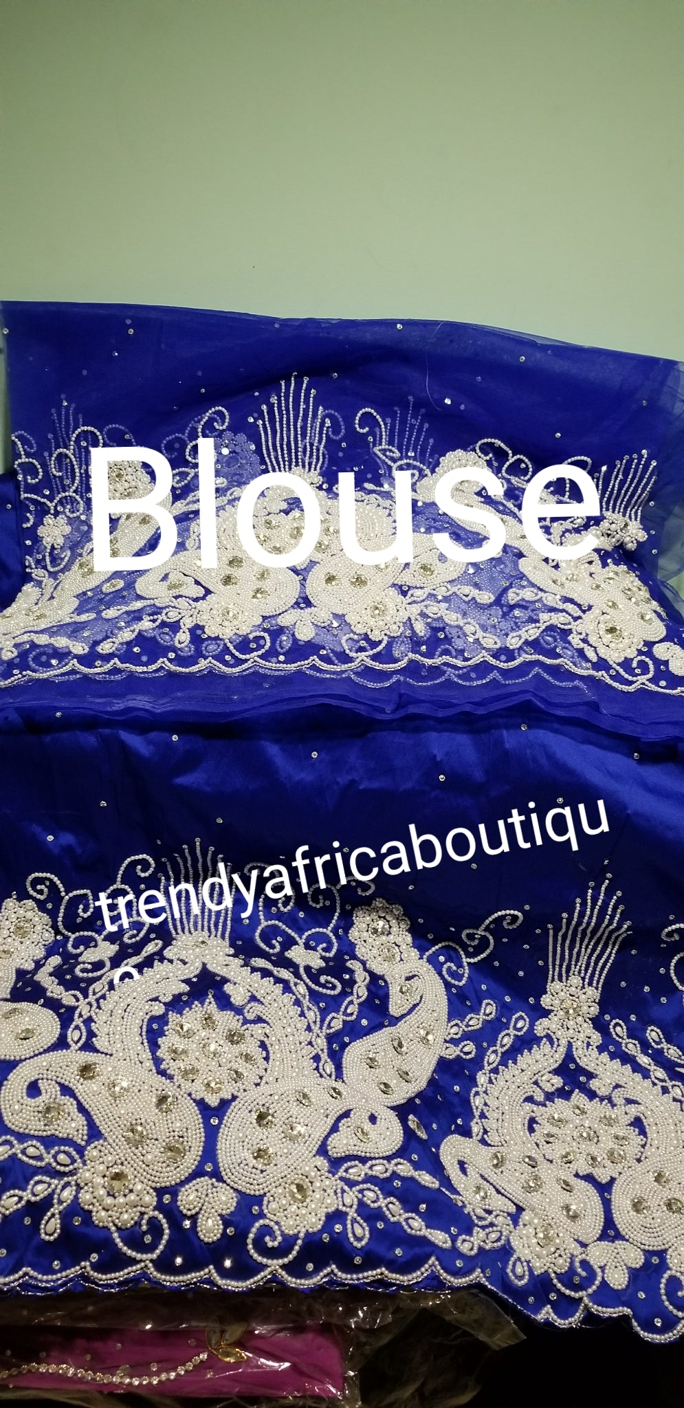 Quality VIP royal Blue Nigerian Tradional wedding George Wrapper and matching net blouse. Sold as a set of 5yds and 1.8yds blouse fabric.  beaded and stone work is all hand made work. Quality Silk George