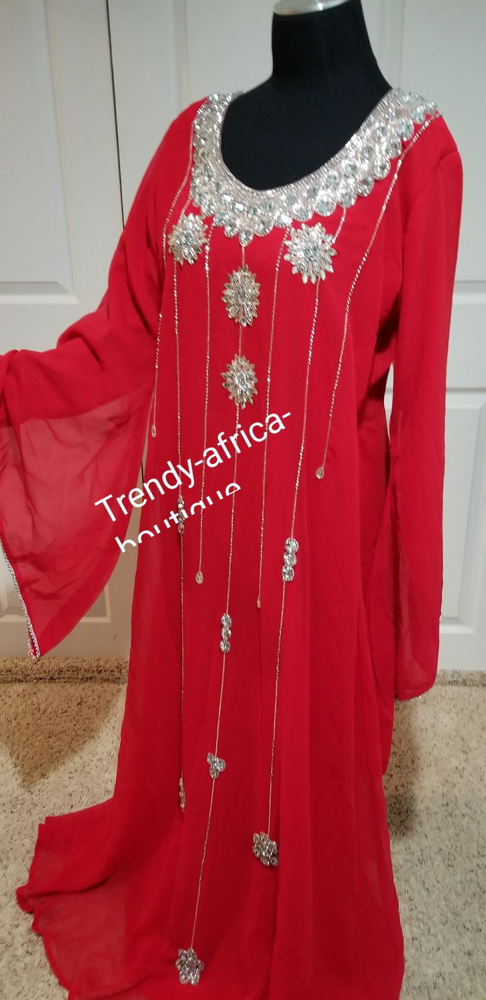 Red free flowimg Kaftan dress on sale. 60' long size Medium fit 44" Burst. Inner dress have belt for easy adjustments. Beaded with dazzling Crystal stones to perfection