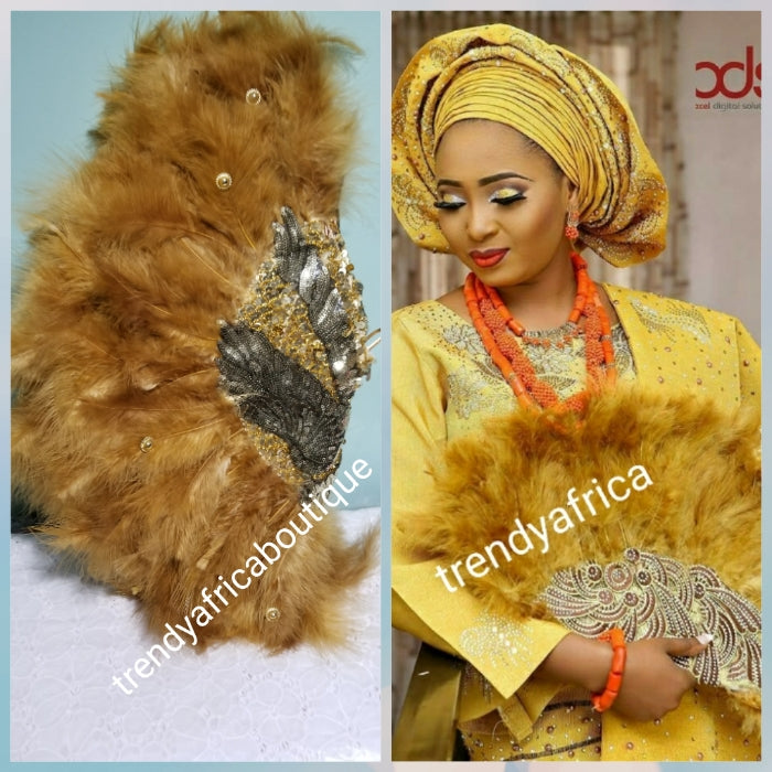 Latest Gold Feather hand fan. Nigerian Traditional wedding accessories for celebrant. Beaddazzled with sequence handle