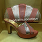 Size 42 Peach/gold Italian matching platform shoe and hand clutch. Quality Italian made shoe and bag. Sold as a set