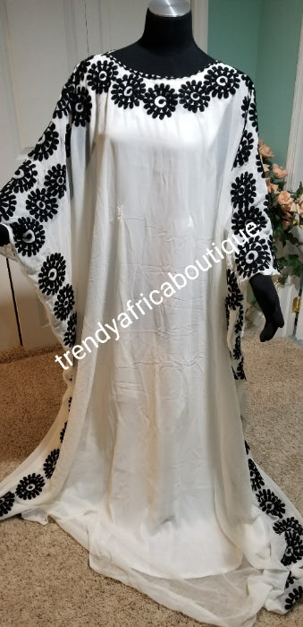 One size fit Dubai dressy kaftan. Free flowing bubu in Gorgeous White/black Embriodery. 60 inches full lenght. Women dress kaftan