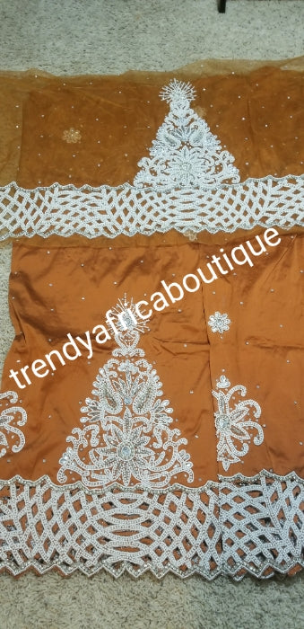 New arrival Burnt Orange Gorgeous Igbo/Delta silk George wrapper and matching net blouse. 5yds + 1.8yds matching net for blouse. Sold as a set, price is for a set