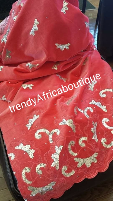 Coral color velvet George Wrapper. Embellished with sequence and stones. 2.5 yards for wrapper. Use for 1st outing Nigerian traditional wedding