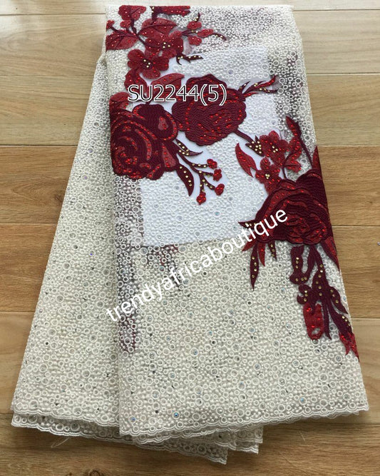 Classic quality Nigerian french lace fabric. Cream/wine embriodery design and embellished with colorful stones for perfection. Unique design. Sold per 5yds
