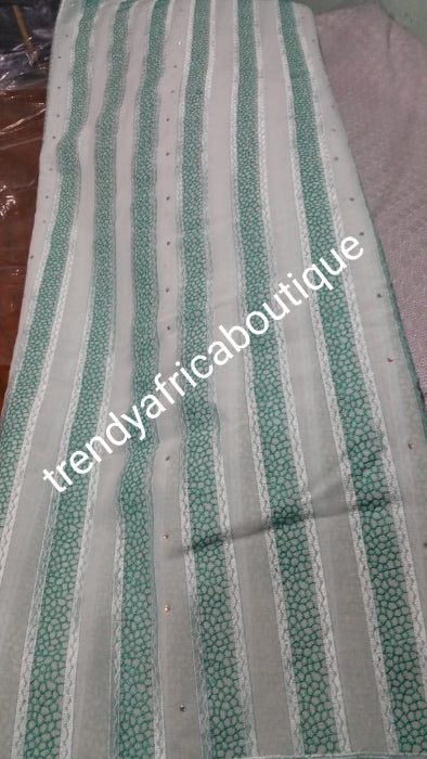 On Sale: quality men swiss Voile lace fabric for making Nigerian native cloting for men. Soft texture. Sold per 5yds. In white/Green