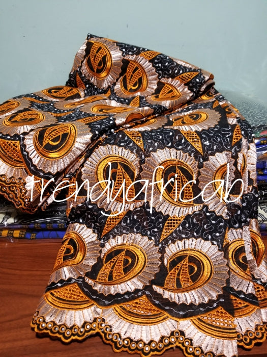Clearance item: Black/Orange/champagne swiss Lace fabric. Embriodery and stones work. Soft quality lace fabric for African native outfit