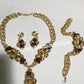 New 18k gold plated Costum Necklace set. Gold/chocolate brown accent. 3pcs. Bracelet fit 7" and 8" wrist. Sold as a set