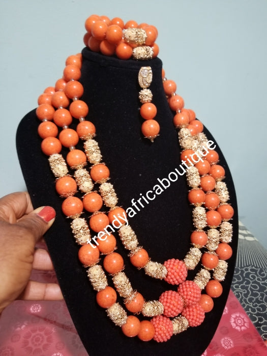 New arrival Edo round coral-necklace set. Traditional Bridal wedding Coral beads  long row in 3 pce. earrings and double Bracelets. Exclusive Nigerian Native bead design with gold accessories sold per set. Bridal-accessories