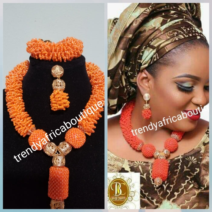 Original Coral-necklace set. Small coral beads in cluster necklace for Nigerian traditional use. Sold with matching bracelet and earrings. Bracelet fit 7-8" wrist