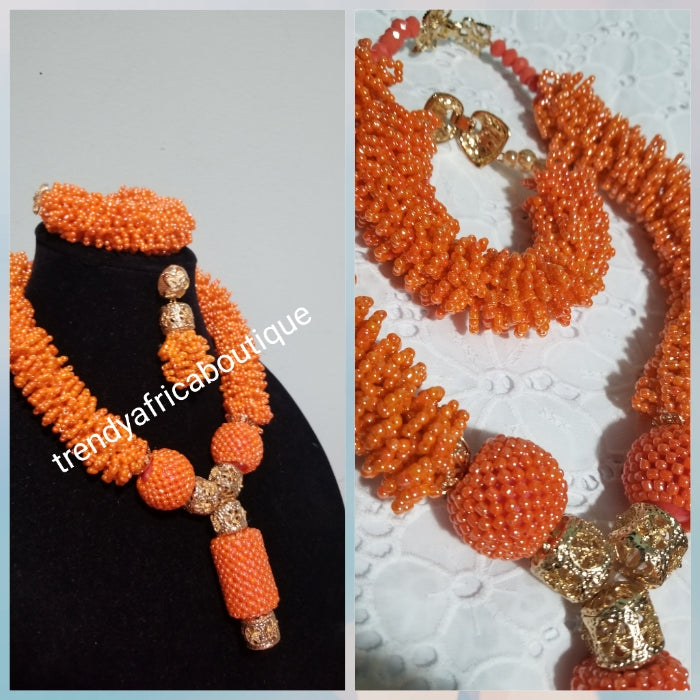 Original Coral-necklace set. Small coral beads in cluster necklace for Nigerian traditional use. Sold with matching bracelet and earrings. Bracelet fit 7-8" wrist