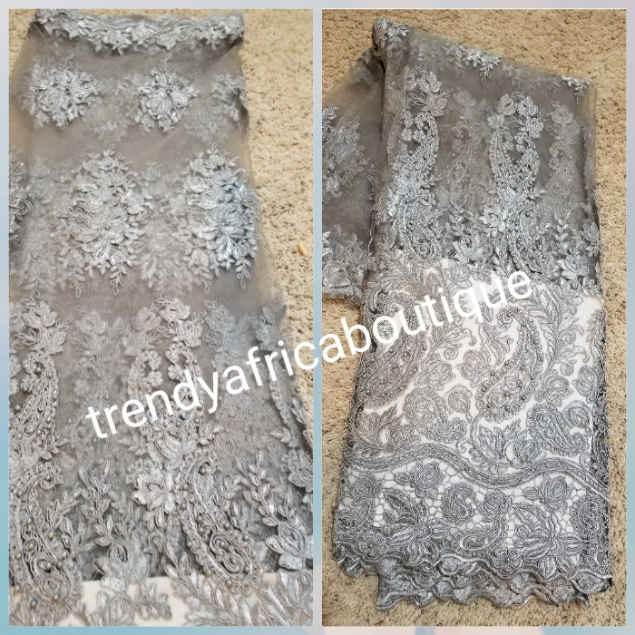 Clearance sale: Organza handcut lace fabric in beautiful silver. Beaded and stoned Sfrican lace fabric for making party outfit. Sold per 5yds