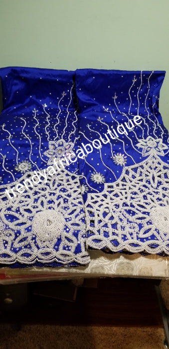 Currently out of stock. Can Make per order. Royal blue VIP hand beaded and stoned Silk George wrapper. Classic color for Nigerian Traditional wedding Outfit. Sold as 5yds + 1.8uds matching net blouse. Allow 4 weeks