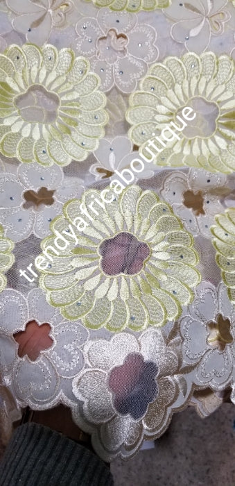 Clearance Item: African embriodery lace fabric in Cream/yellow. Quality Swiss Voile/net lace fabric for making African party wear. Sold per 5yds