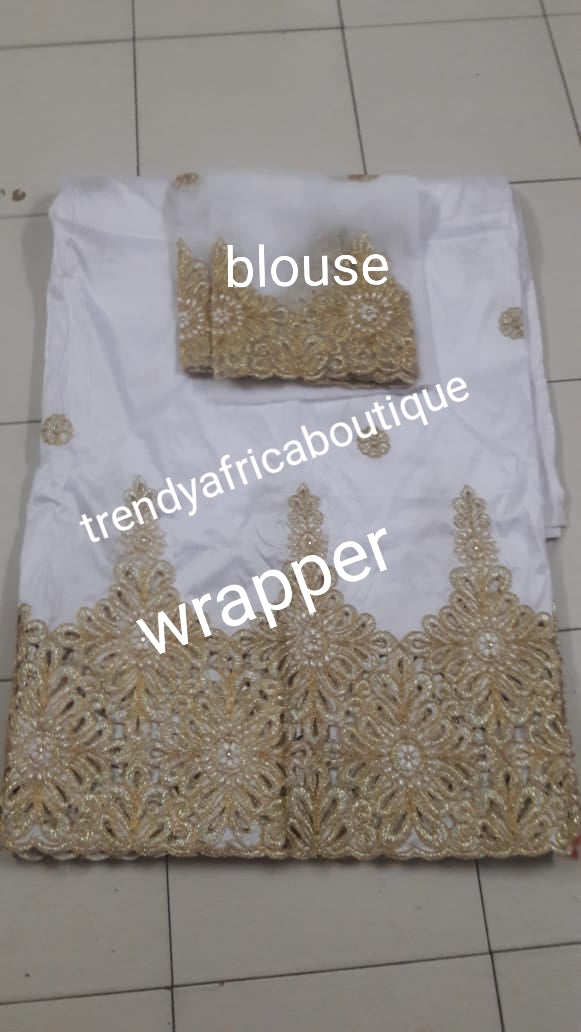 SALE: Original quality White/gold embriodery and beaded silk George wrapper. Nigerian traditional wedding George, Quality Indian-George. 5yds wrapper + 1.8yds net matching blouse. Aso-ebi available. Contact us for detail.