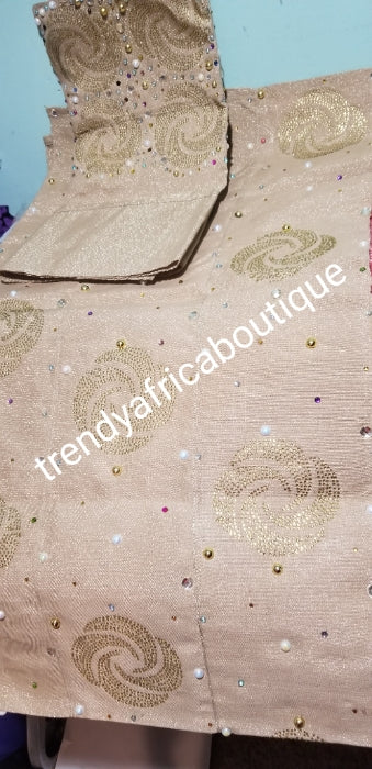 Quality Champagne Gold bedazzled Aso-oke set. Woven in Nigeria. Latest Celebrant Aso-oke for Gele/Ipele (shoulder shawl) /cap piece for men. 3pcs set is sold as a set and price if for the set