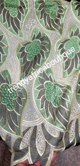SALE: original quality Swiss voile lace. Classic design at give away price. Sold as 5yds and price is for 5yds. Olive green/beige