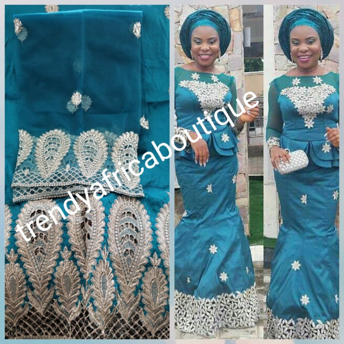 Teal green Embriodery Nigerian wedding George fabric and net blouse. Come 5yds +1.8yds wrapper. New arrival aso-ebi Silk George. Sold as a set. Small-George for Nigerian party dress