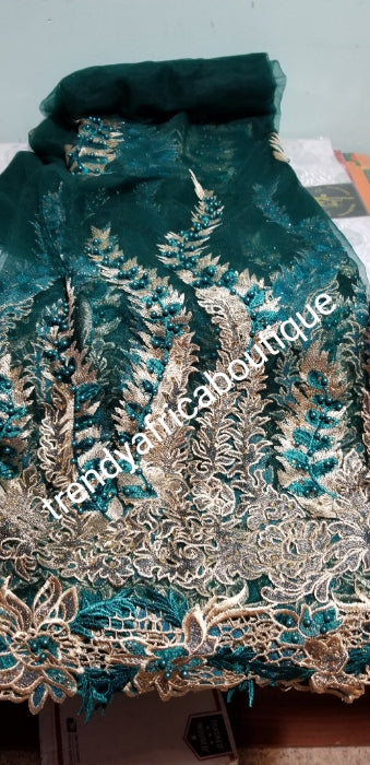 Green/gold Net French fabric, Luxery Embriodery  African french lace fabric. Beaded and stoned to perfection. Sold per 5yds price is for 5yds. Beautiful border handcut embriodery work