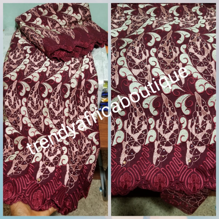 Maroon Swiss lace Fabric. Quality embroidery, all over crystal stones. Sold per 5 yards, peice is for 5yds. Nigerian celebrants Swiss lace at a discount price