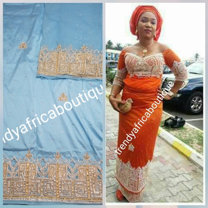 Clearance: Beautiful sky blue Nigerian traditional Igbo/delta women/men wrapper for big ceremoney. Original quality silk George wrapper for Traditional wedding oufit. Sold as wrapper and 1.8yds matching blouse