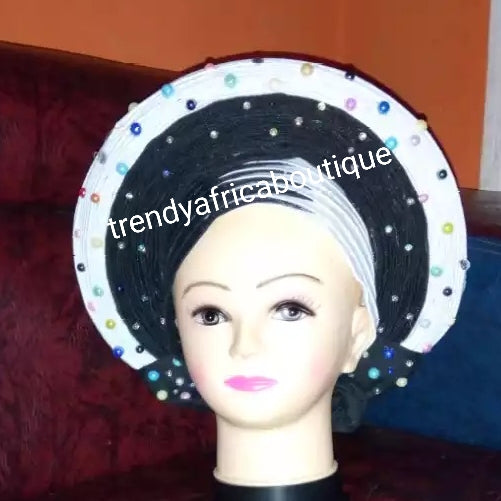 Black/white Auto-gele. Nigerian aso-oke made into auto gele. Silver color, beaded and stoned. Party ready in less than 5 minutes. One size fit, easy adjustment at the back.