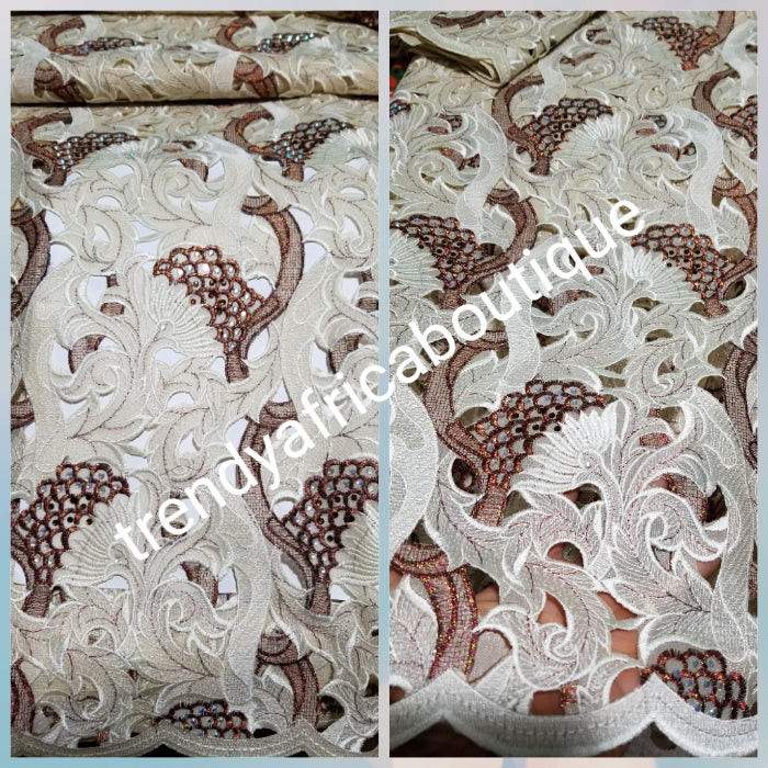 Quality swiss lace fabric in champagne/chocolate embroidery. All over crystal stones. Celebrant swiss lace for Nigerian party outfit. Sold per 5yds