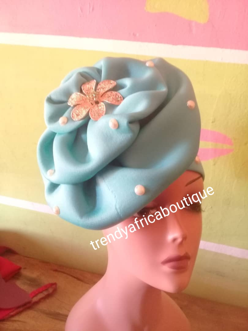 Assorted colors women-turban. One size fit hair turban. Beautiful flower design with a side brooch to add decor to your turban