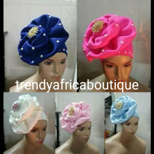 Assorted colors women-turban. One size fit hair turban. Beautiful flower design with a side brooch to add decor to your turban