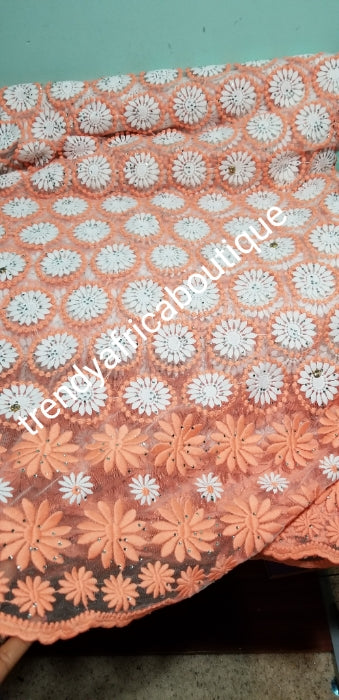 Clearance: peach/white French lace fabric.  Quality embriodery, all over dazzling crystal stones.  Sold per 5yds. Price is for 5yds. Beautiful African embriodery french lace- swiss quality design
