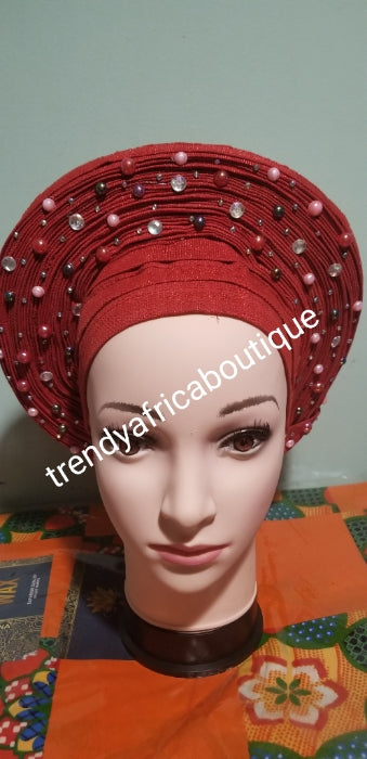 RED Auto-gele made with quality Aso-oke. Beaded and stoned quality hand work. One size fit, easy to adjust for fit and knot at the back