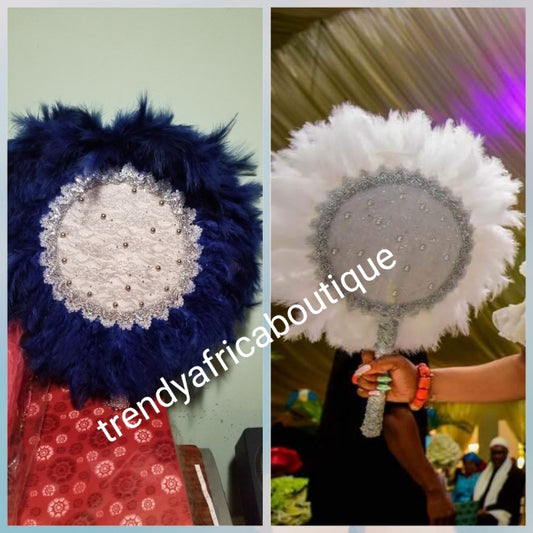 Latest feather hand fan in beautiful dark royal blue. Bridal Accessories hand fan for celebrant. Fully handmade with silver handlel. Nigerian Bride fluffy feathers hand fan