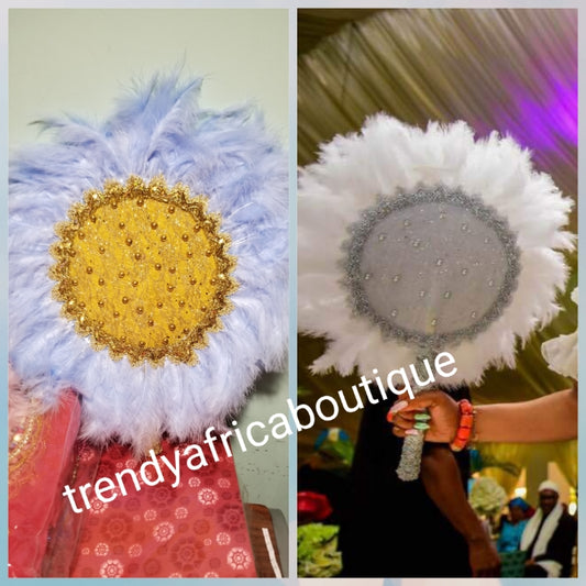 Lateat feather hand fan in beautiful powder blue color. Bridal Accessories hand fan for celebrant. Fully handmade with handle. Nigerian Bride fluffy feathers hand fan