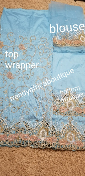 Clearance  sky blue VIP George for Nigerian/Igbo/delta Traditional weddings/birthdays and more wrapper + 1.8yds net fabric for making blouse. Sold as. A set of wrapper and blouse. Original quality silk. "Feel the difference in Quality"