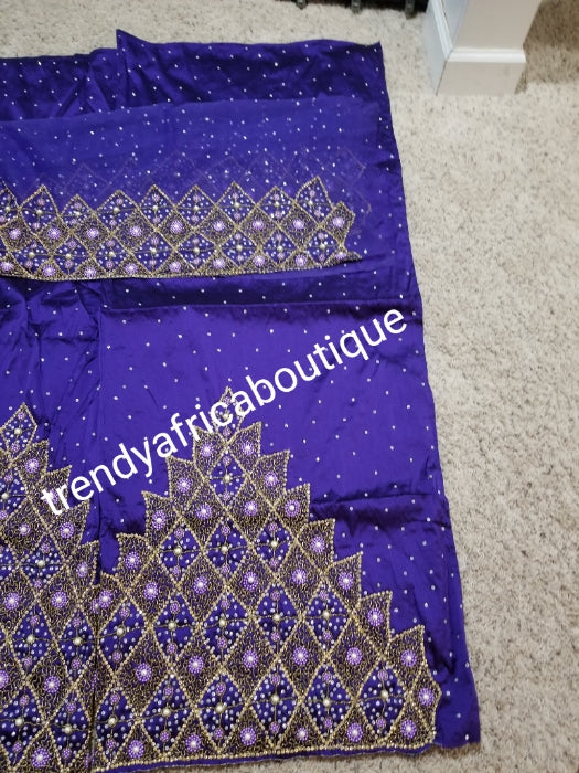 Sale: quality Celebrants purple Hand stoned silk George wrapper for Nigerian party outfit. Sold per set of 5yds+1.8yds net for making a blouse. All over stones with master piece design.