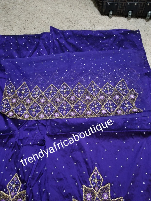 Sale: quality Celebrants purple Hand stoned silk George wrapper for Nigerian party outfit. Sold per set of 5yds+1.8yds net for making a blouse. All over stones with master piece design.
