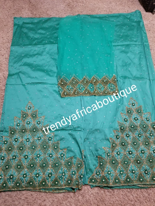 Clearance: quality Celebrants Sweet Green with all over Hand stoned silk George wrapper for Nigerian party outfit. Sold per set of 2.5yds + 2.5yds+1.8yds net for making a blouse. Nigerian, Delta/Igbo/Edo weddings