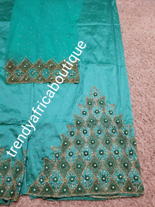 Clearance: quality Celebrants Sweet Green with all over Hand stoned silk George wrapper for Nigerian party outfit. Sold per set of 2.5yds + 2.5yds+1.8yds net for making a blouse. Nigerian, Delta/Igbo/Edo weddings