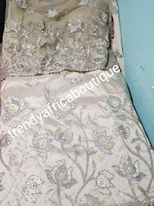 New arrival: Nigerian Traditional Silk embroidery George wrapper. Quality embroidery + Hand Beaded/stones design in Cream color 5yds + 1.8 matching net blouse. Igbo/delta bride outfit. Small-George.