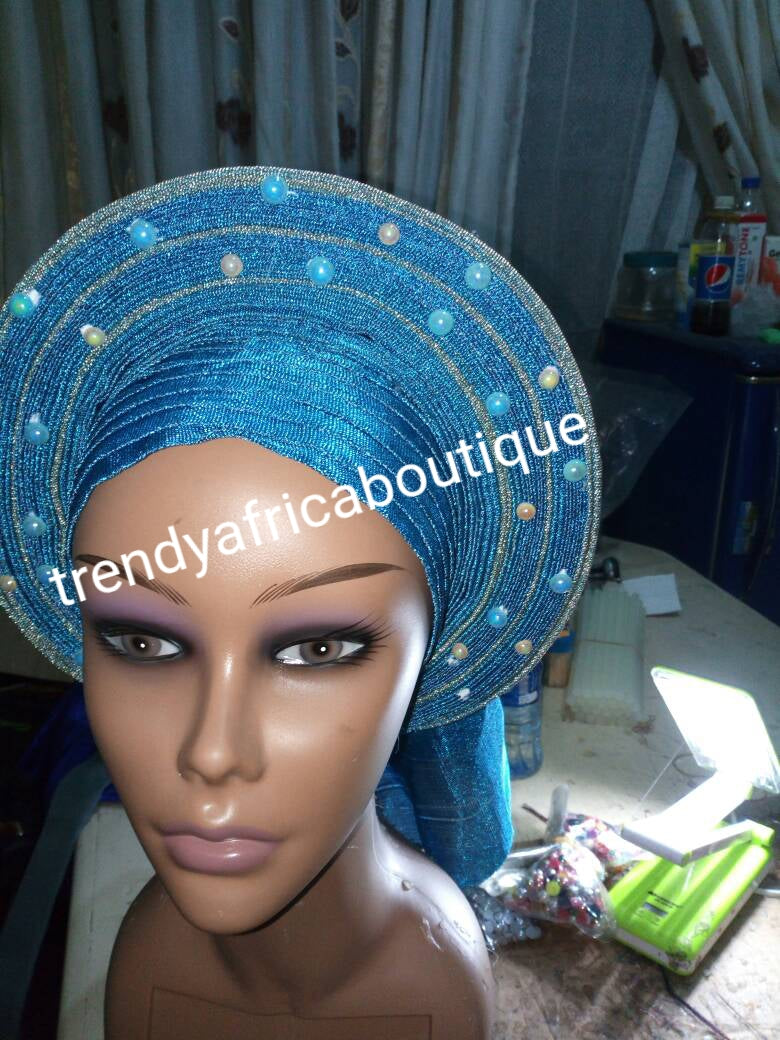 Turquoise blue/silver auto-gele. One size fit all. Wahala free gele, party ready in seconds. New arrival beaded and  aso-oke gele already made
