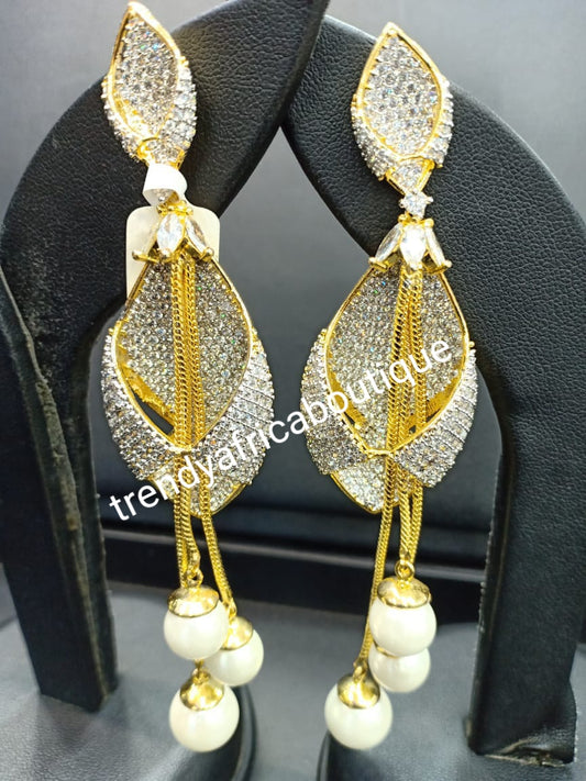 22k electroplated America Diamond-earings. Hand set with quality dazzling CZ stones. Original quality, hypoallergenic. Light weight drop-earrings