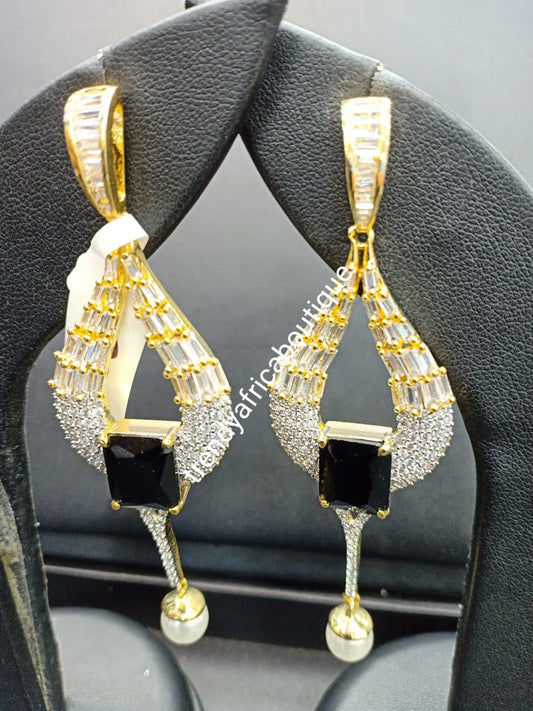 22k electroplated America Diamond-earings. Hand set with quality dazzling CZ stones. Original quality, hypoallergenic. Light weight drop-earrings