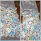 New arrival french lace fabric. Beautiful 3D flower border made to perfection.  Ideal for evening gown, or Nigerian traditional wedding outfit. This color is light gray mix with blue and white petals. Sold per 5yds